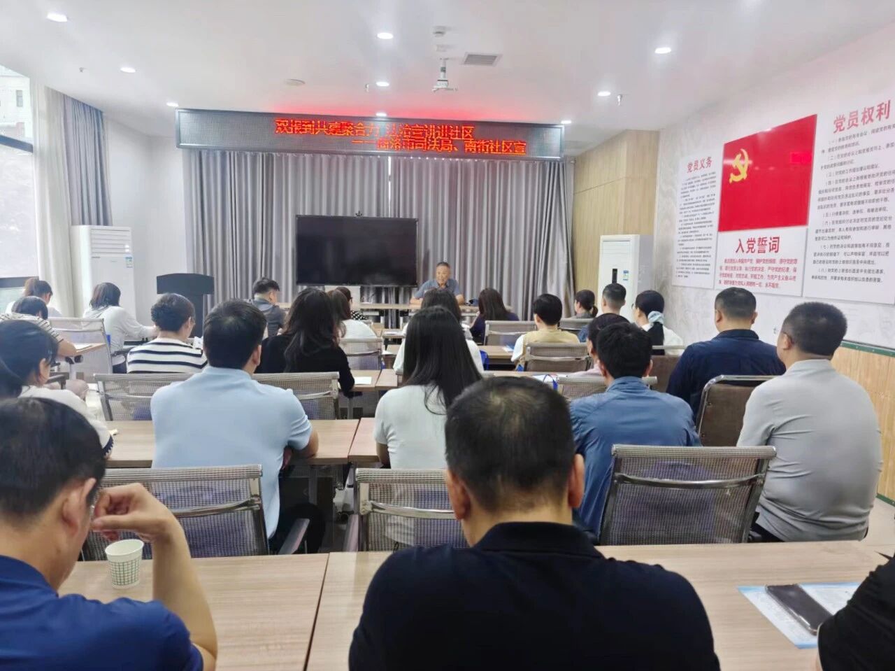 商洛市司法局赴南街社区开展“双报到”暨主题党日活动